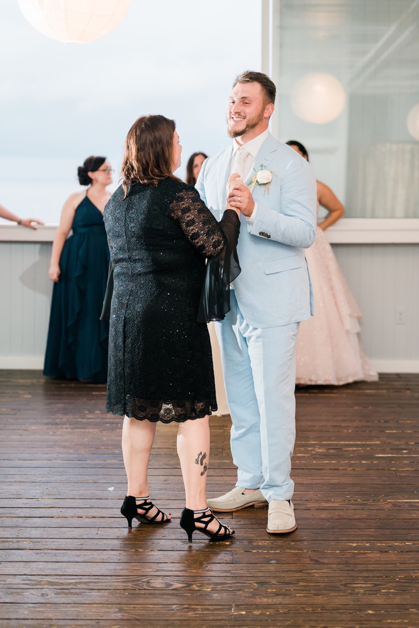Chesapeake Bay Beach Club Wedding photos, Mother Son dance at CBBC, Rainy wedding inspiration