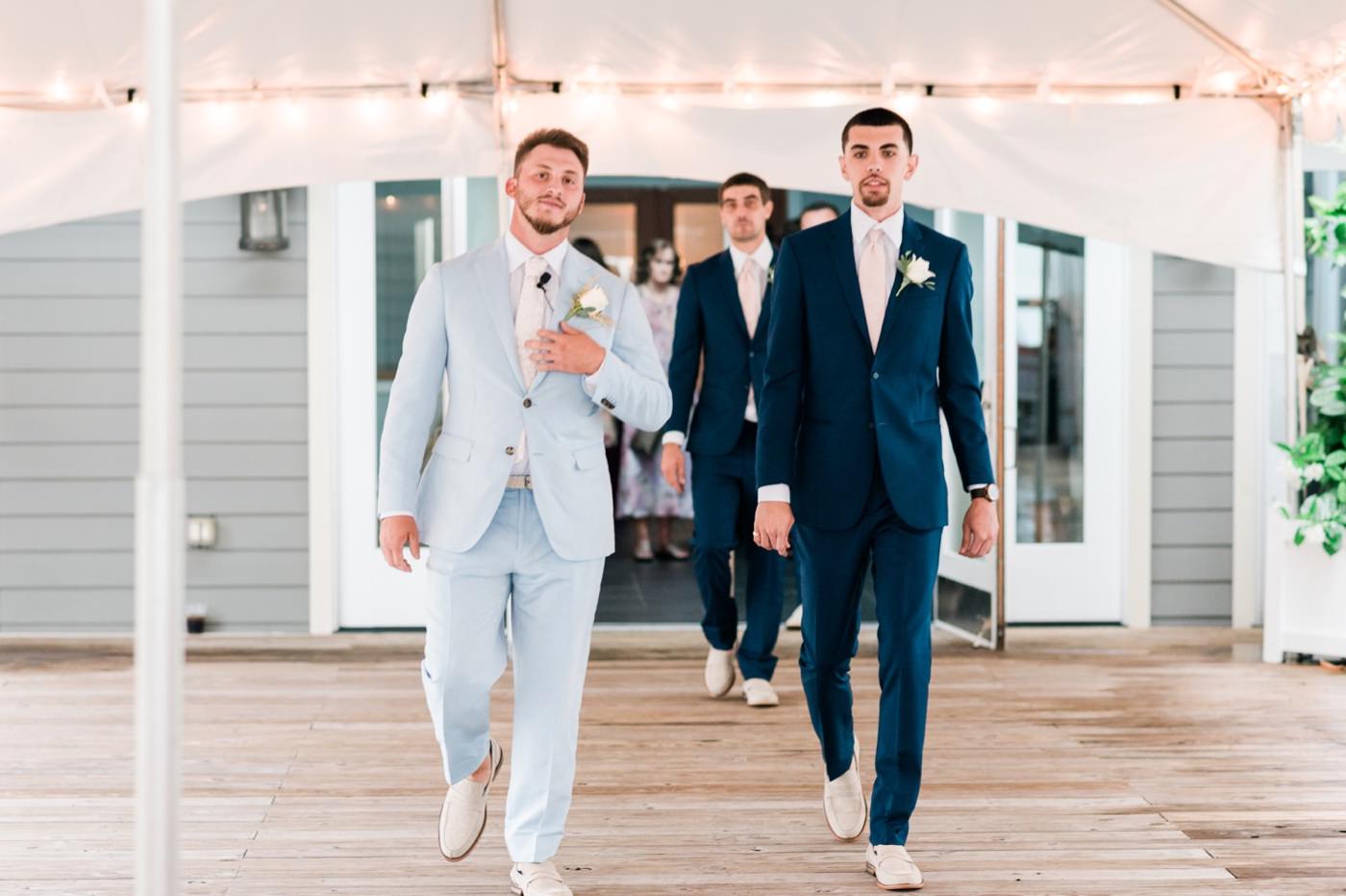 Chesapeake Bay Beach Club Wedding photos, groom and groomsmen enter wedding, CBBC, Rainy wedding inspiration
