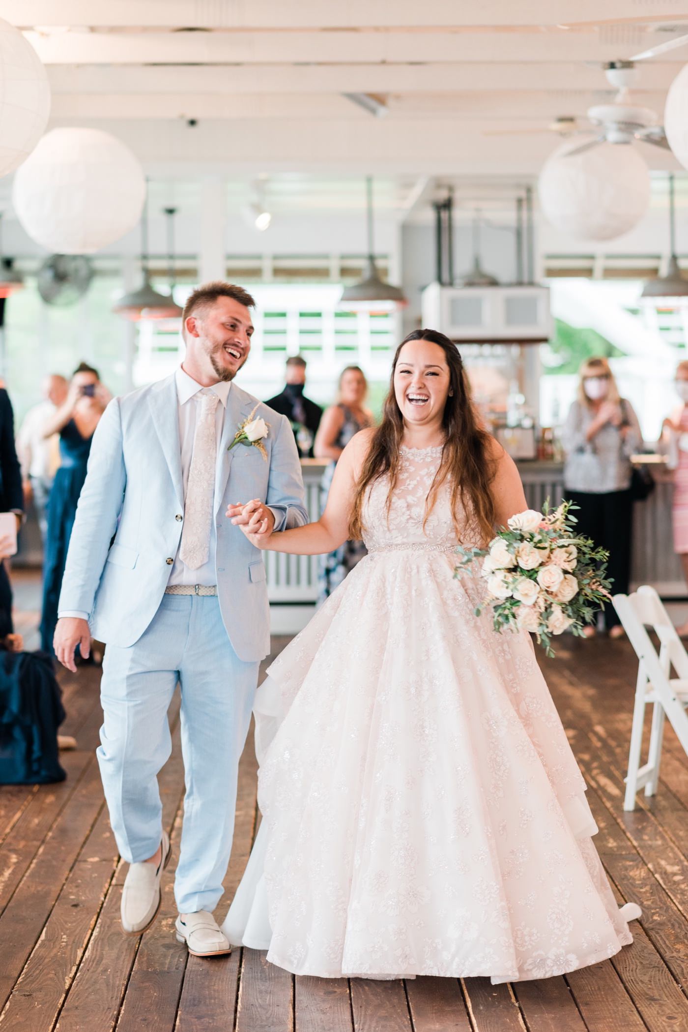 Chesapeake Bay Beach Club Wedding photos, bride and groom announced into reception, CBBC, Rainy wedding inspiration
